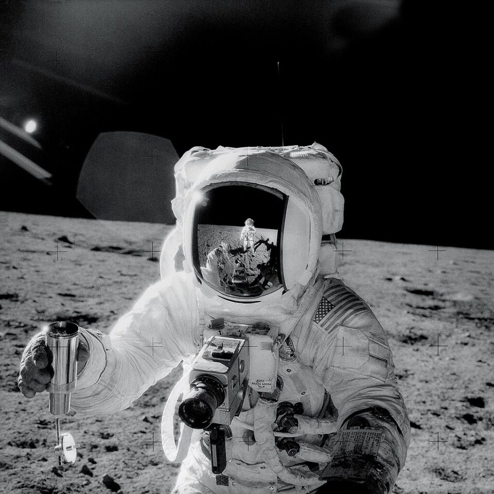 Al Bean of Apollo 12 with regolith sample container
